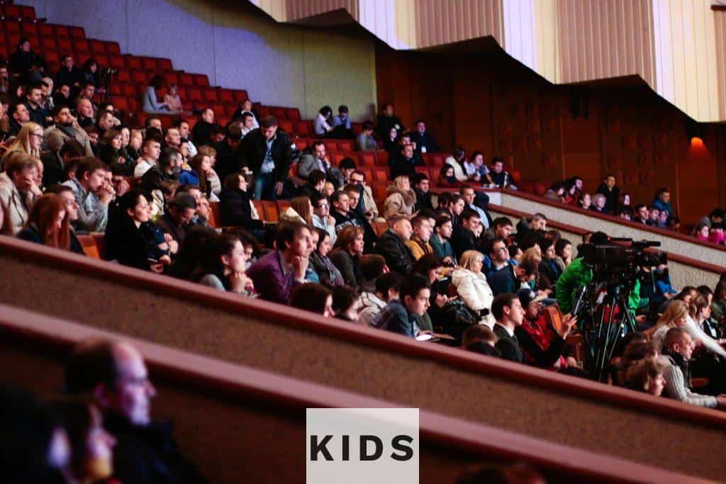 People Sitting Watching In The Theater